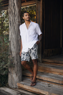 By The Sea Bali Paulo Bermuda Shorts in Little Palm White - tailored tropical-print shorts for easy summer days in bali