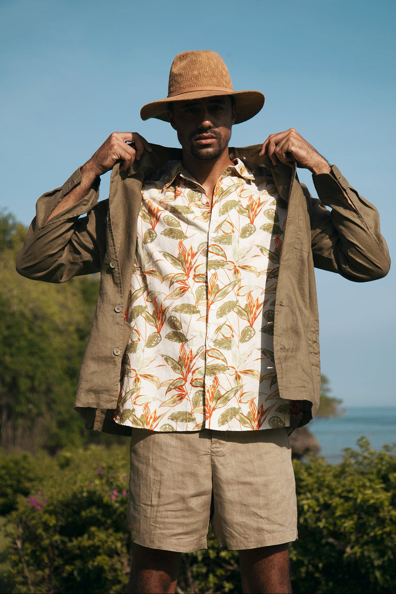 man wearing travel hat at luxury hotel in bali