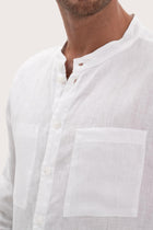 Close-up texture of the breathable linen fabric and premium craftsmanship