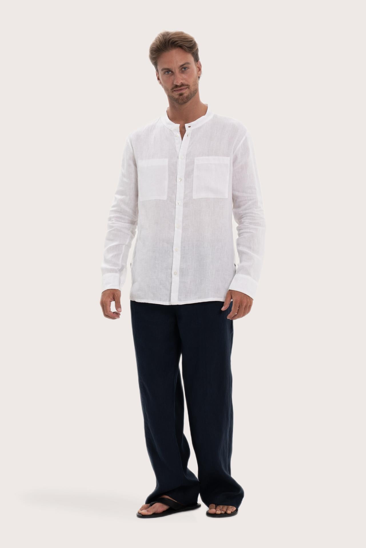 Model wearing the white linen Abra shirt by By The Sea Bali