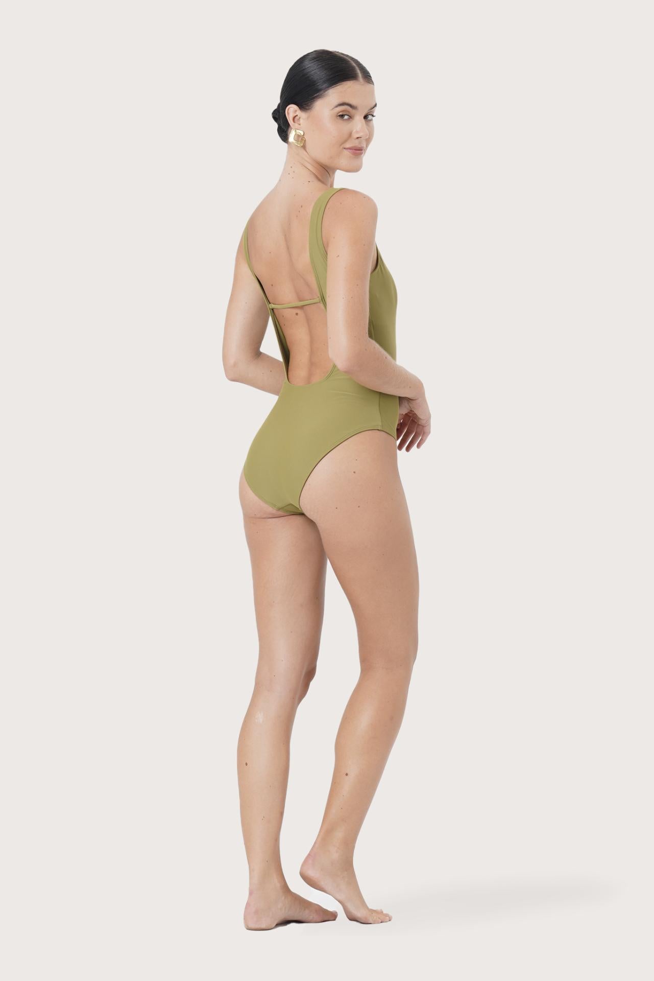 Side profile of Alani One Piece Swimsuit highlighting its sleek shape