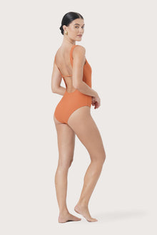 Side profile of Alani One Piece Swimsuit highlighting its sleek shape