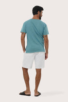 Back view of the By The Sea Bali Aling Cotton T-shirt Light Green Forest – clean tailoring and refined craftsmanship