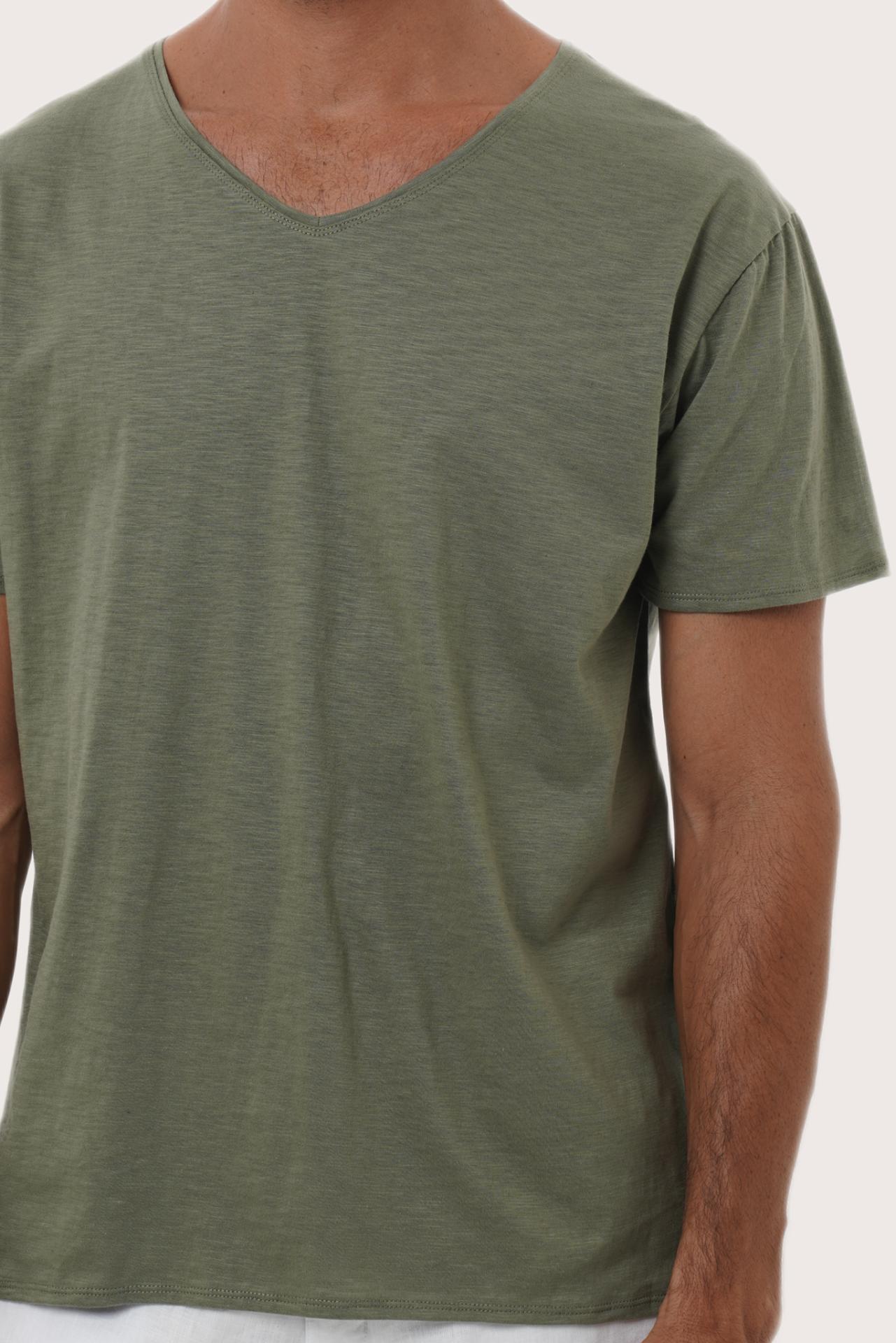 Neckline and stitching detail of the Light Sage Aling Cotton T-Shirt by By The Sea Bali