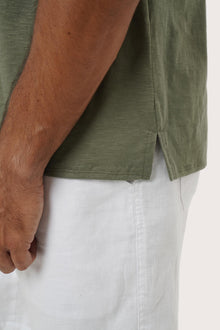 Men's everyday styling featuring the Aling Cotton T-Shirt in Light Sage by By The Sea Bali