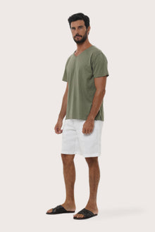 Soft cotton fabric and texture detail of the Light Sage Aling T-Shirt by By The Sea Bali