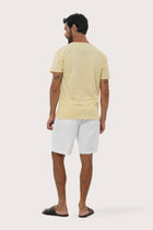 Back view of the By The Sea Bali Aling Cotton T-shirt Light Yellow – clean tailoring and refined craftsmanship