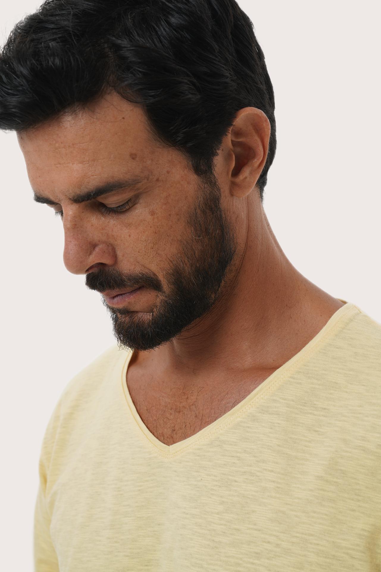 Close-up of the Aling Cotton T-shirt Light Yellow by By The Sea Bali – exceptional fabric quality and texture