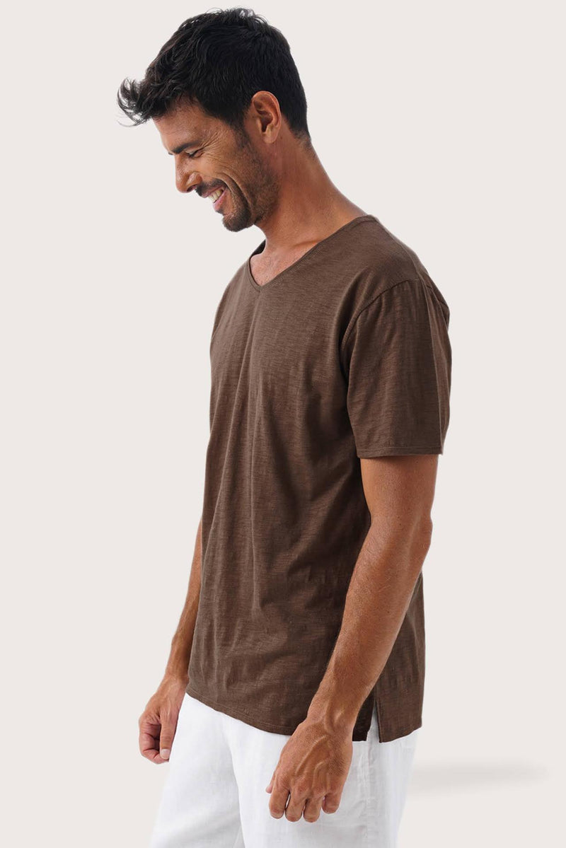 Side profile of the Aling T-Shirt Brun by By The Sea Bali – relaxed drape and understated island elegance