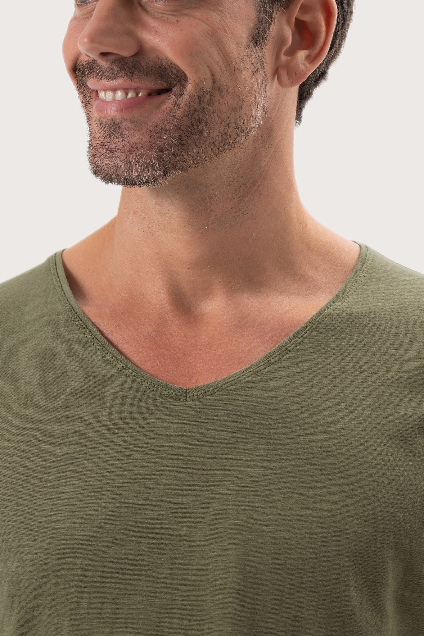 Close-up of the Aling T-Shirt Khaki by By The Sea Bali – exceptional fabric quality and texture