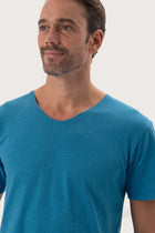 Close-up of the Aling T-Shirt Light Blue by By The Sea Bali – exceptional fabric quality and texture