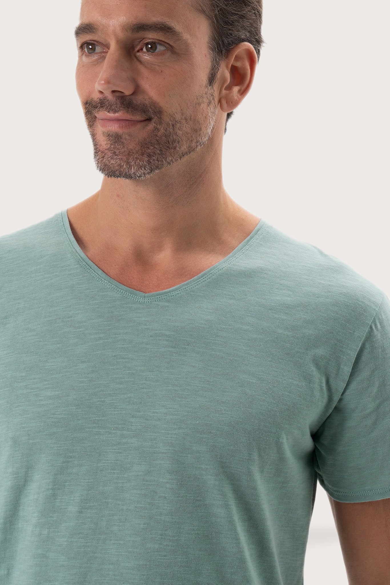 Close-up of the Aling T-Shirt Sage by By The Sea Bali – exceptional fabric quality and texture