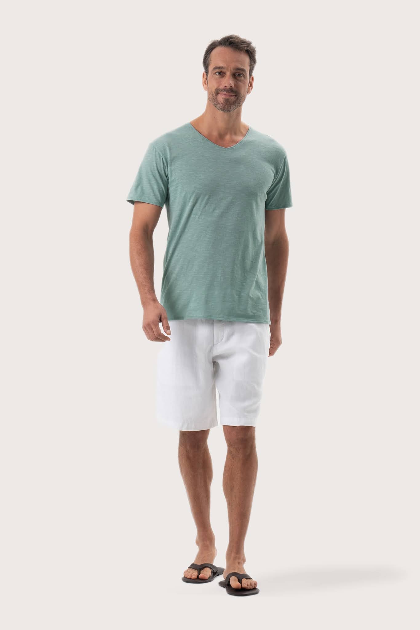 Aling T-Shirt Sage by By The Sea Bali – angled front view showcasing the tailored island silhouette