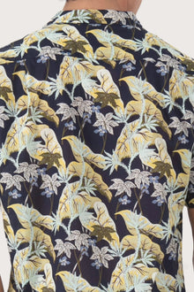 Open collar and button-front detail of the Alola Cotton Shirt Sivala Navy by By The Sea Bali
