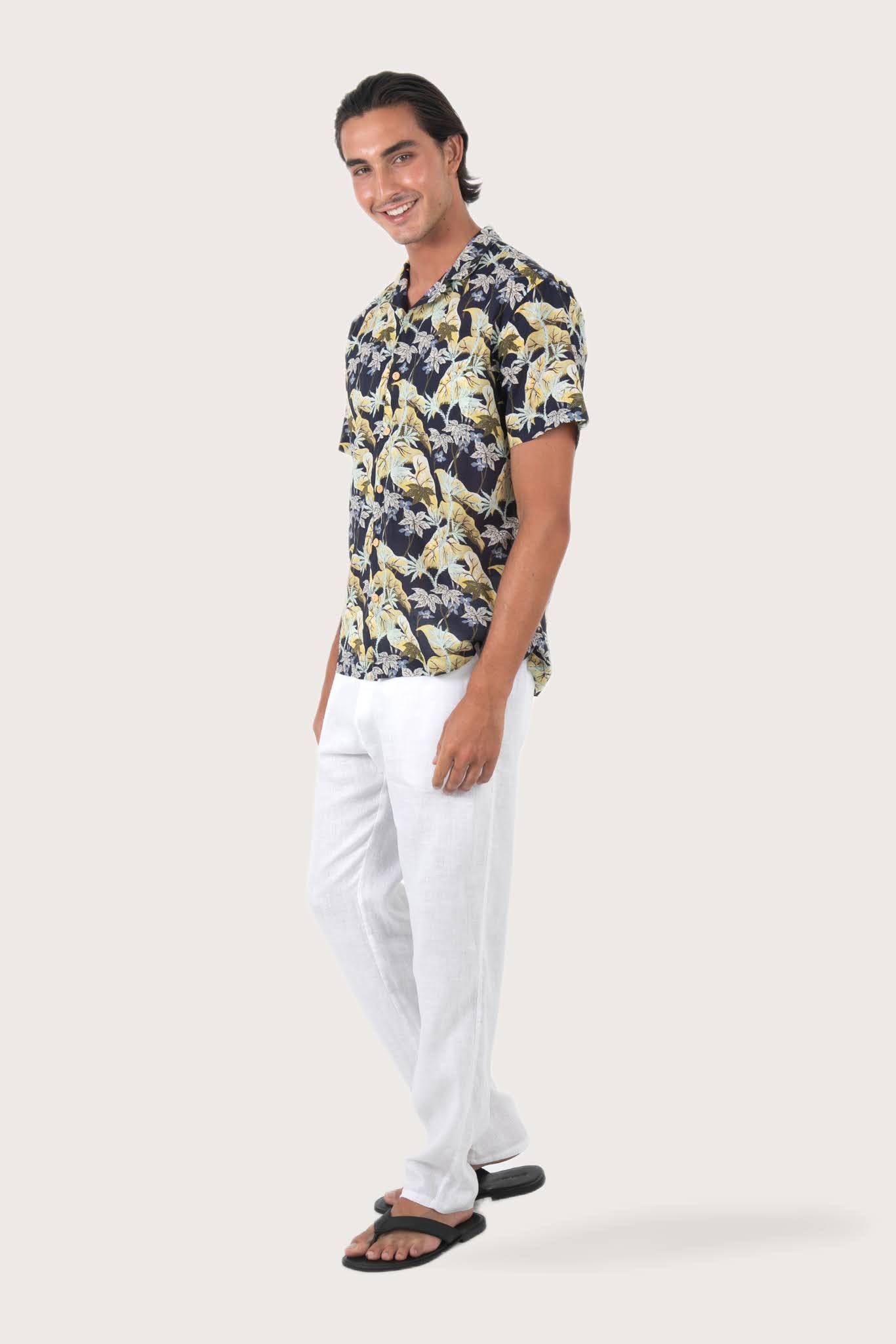 Side profile of the Alola Cotton Shirt Sivala Navy highlighting its easy, breathable fit by By The Sea Bali