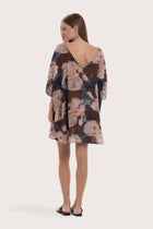 Back view of the brown Malva short kaftan with a relaxed flowing silhouette