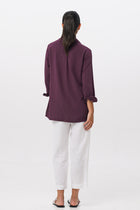 Back view of the Amalia Side Slit Shirt Dark Purple highlighting the garment shape and drape.