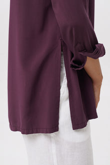Close up detail of the Amalia Side Slit Shirt Dark Purple highlighting craftsmanship and design features.