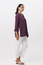Side profile of the Amalia Side Slit Shirt Dark Purple showing its cut and natural movement.