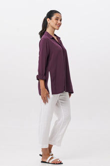 Side profile of the Amalia Side Slit Shirt Dark Purple showing its cut and natural movement.