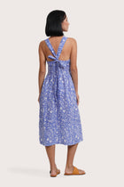 Back view of the Amara Linen Dress Jungle Leave Light Blue highlighting the garment shape and drape.