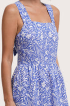 Close up detail of the Amara Linen Dress Jungle Leave Light Blue highlighting craftsmanship and design features