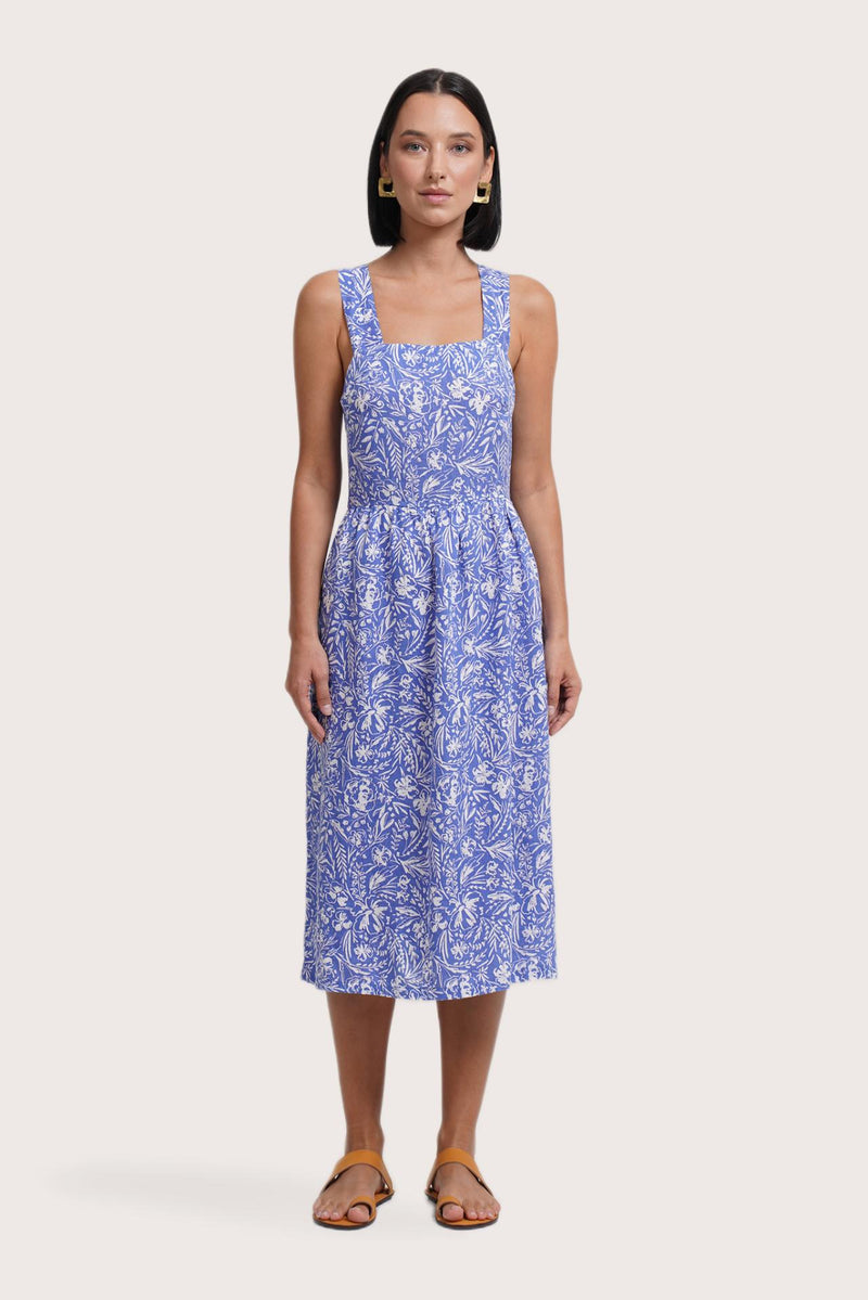 Woman wearing the Amara Linen Dress Jungle Leave Light Blue designed for effortless resortwear and tropical living by By The Sea Bali