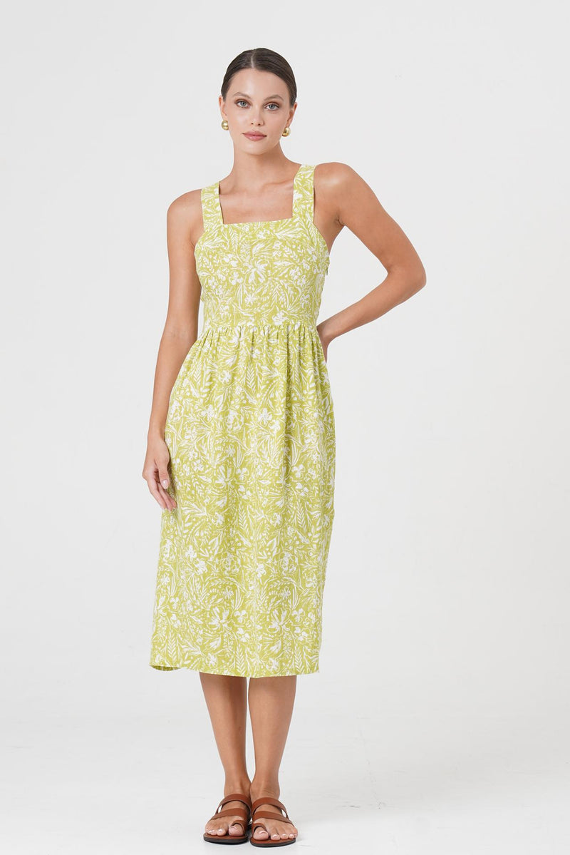 Woman wearing the Amara Linen Dress Jungle Leave Light Green designed for effortless resortwear and tropical living by By The Sea Bali