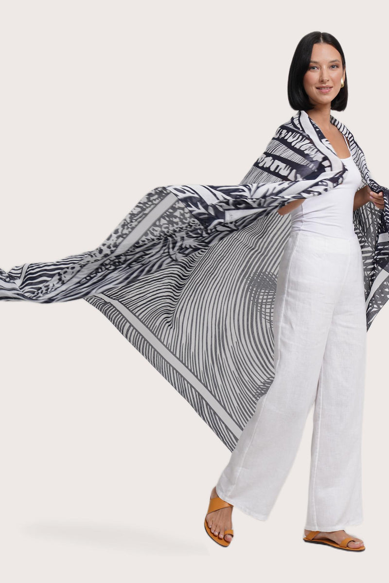 Side view of the Amaya Sarong in Stripe Island styled for tropical escapes