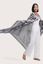 Side view of the Amaya Sarong in Stripe Island styled for tropical escapes