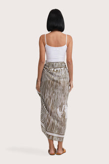 Flowing back silhouette of the Amaya Sarong in Stripe Island