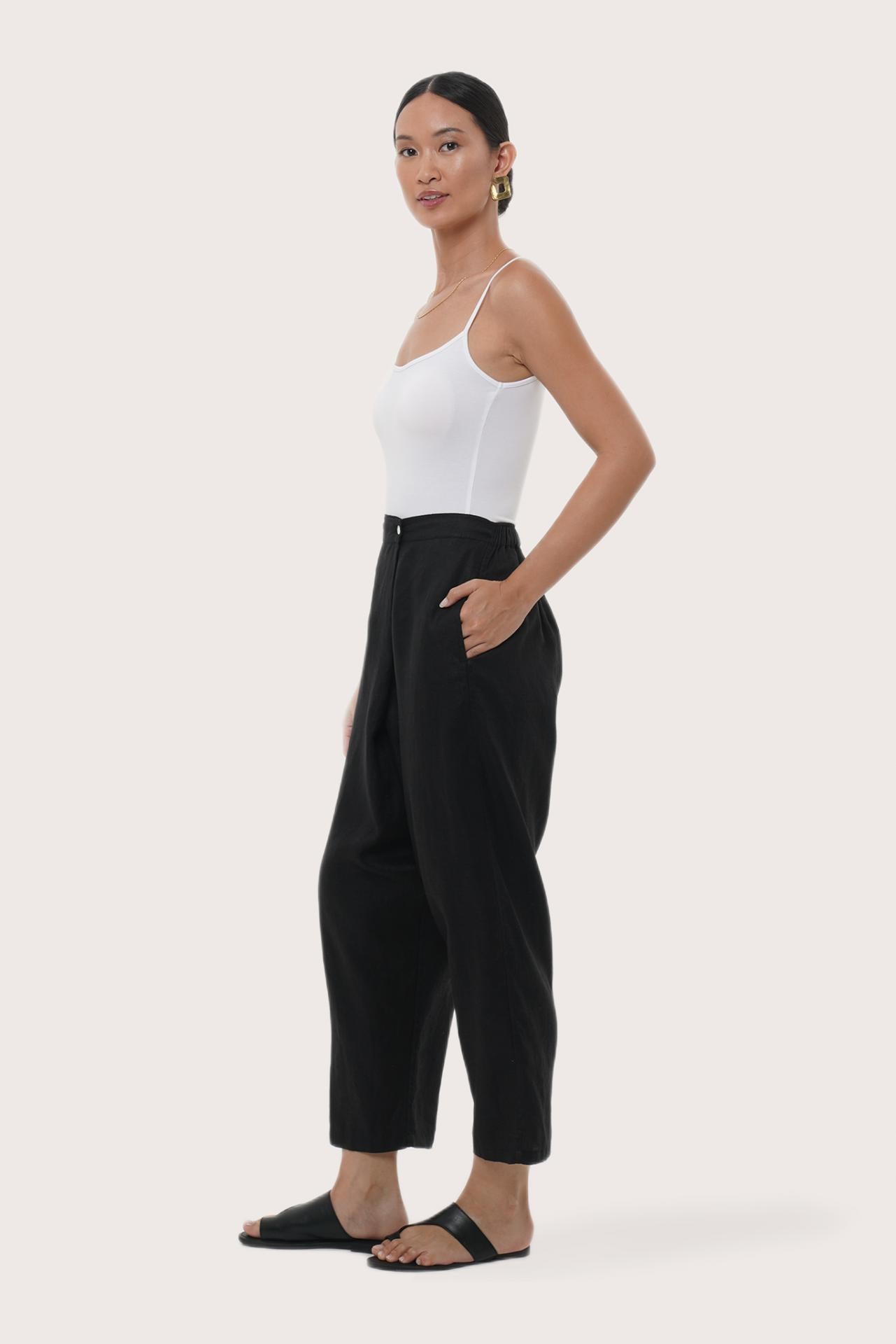 Side profile of the Amber Linen Pant showcasing fluid linen drape