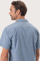 Open collar and button-front detail of the Andres Shirt Light Blue by By The Sea Bali