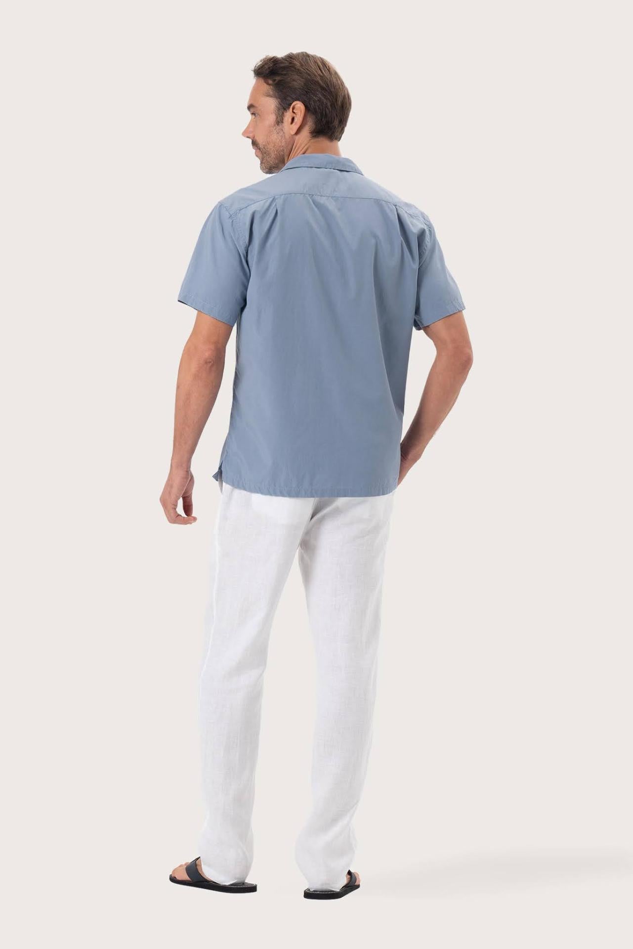 Back view of the Andres Shirt Light Blue showcasing its tailored finish by By The Sea Bali