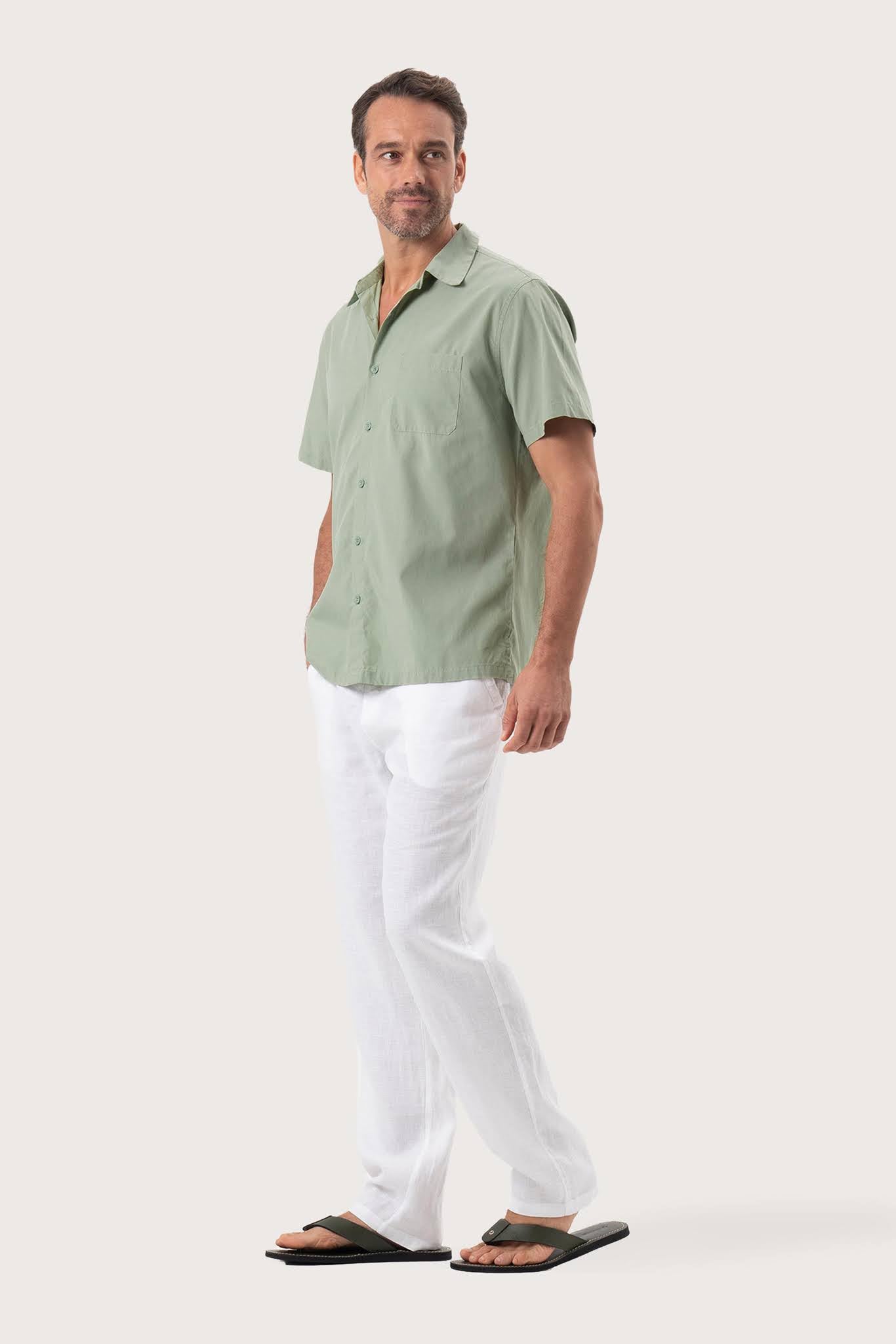 Side profile of the Andres Shirt Sage highlighting its easy, breathable fit by By The Sea Bali