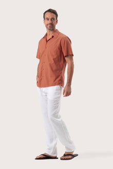 Side profile of the Andres Shirt Terracota highlighting its easy, breathable fit by By The Sea Bali