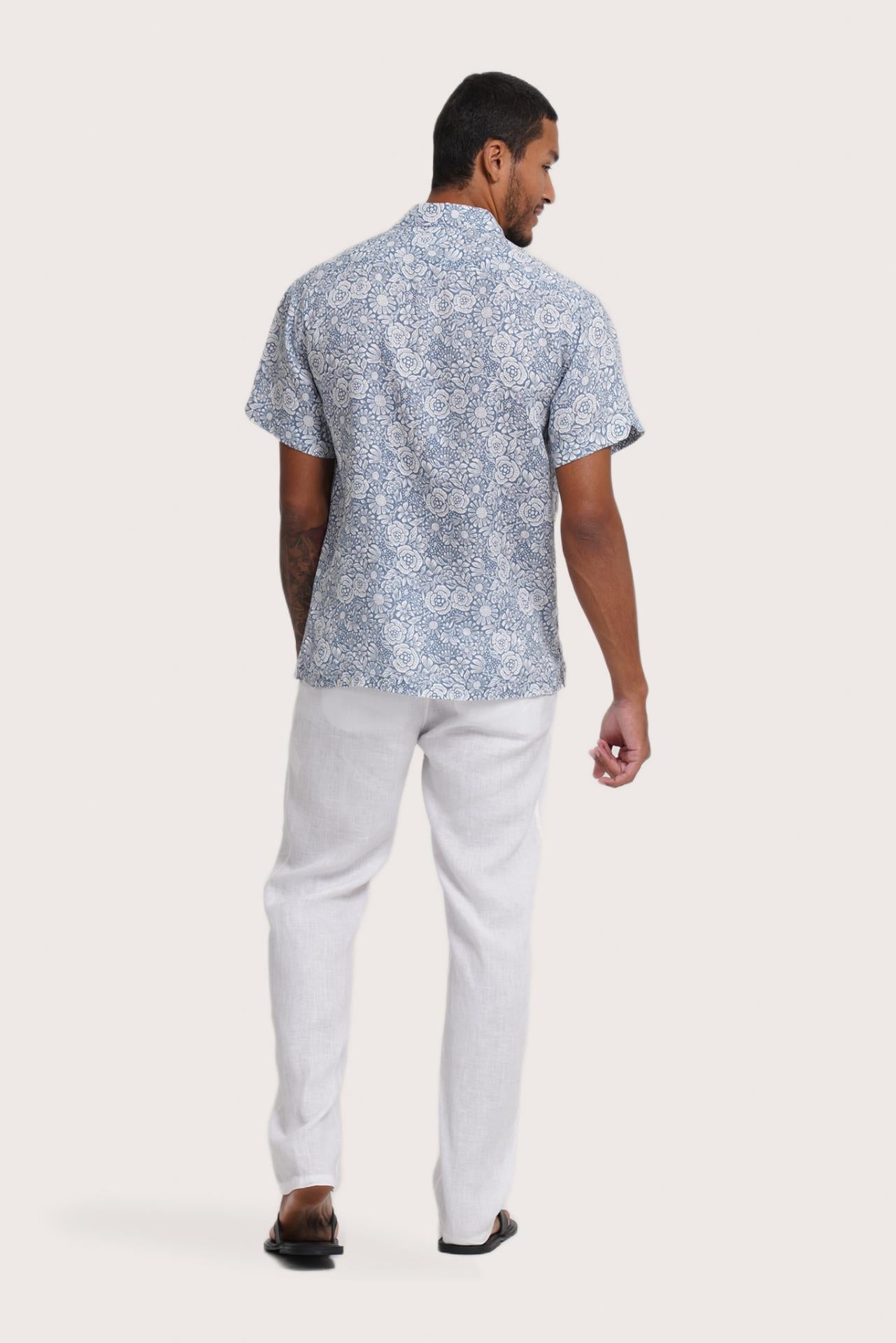 Back view of the Angkasa Linen Shirt Flower Bloom in Light Blue showcasing its tailored finish by By The Sea Bali
