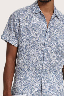 Close-up fabric and collar detail of the Angkasa Linen Shirt Flower Bloom in Light Blue by By The Sea Bali