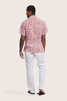 Back view of the Angkasa Linen Shirt Jungle Leaves in Red Brick showcasing its tailored finish by By The Sea Bali