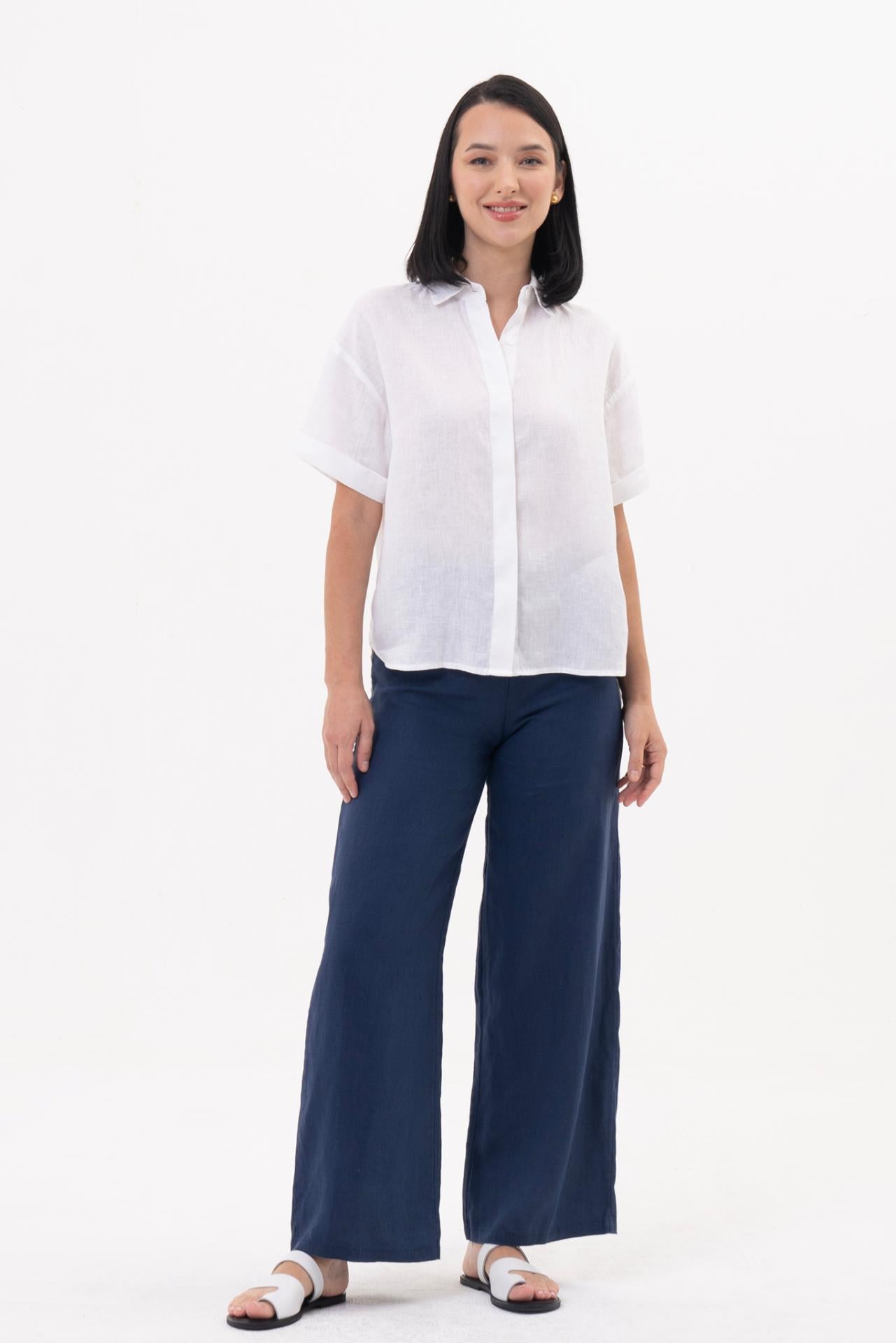 The Anse Short Sleeve Linen Blouse White featuring a relaxed silhouette and effortless resort elegance by By The Sea Bali 