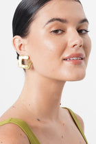 Close-up detail of the Apex Earring showcasing artisanal finishing
