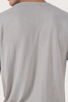 Back detail of the Arco Cotton Knit T-shirt Creme by By The Sea Bali – premium stitching and artisan quality