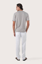 Back view of the By The Sea Bali Arco Cotton Knit T-shirt Creme – clean tailoring and refined craftsmanship