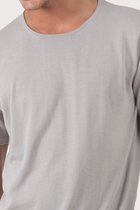 Close-up of the Arco Cotton Knit T-shirt Creme by By The Sea Bali – exceptional fabric quality and texture
