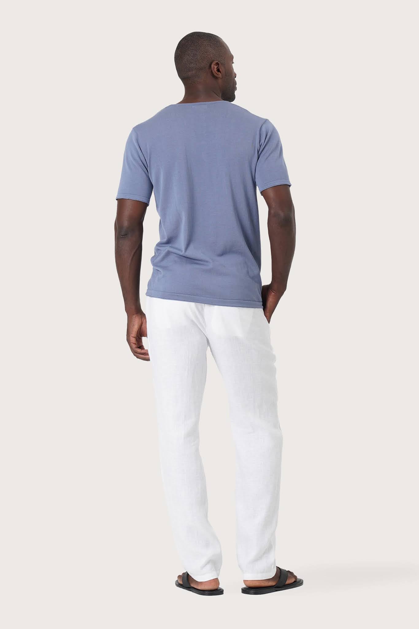 Back view of the By The Sea Bali Arco Cotton Knit T-shirt Denim Blue – clean tailoring and refined craftsmanship