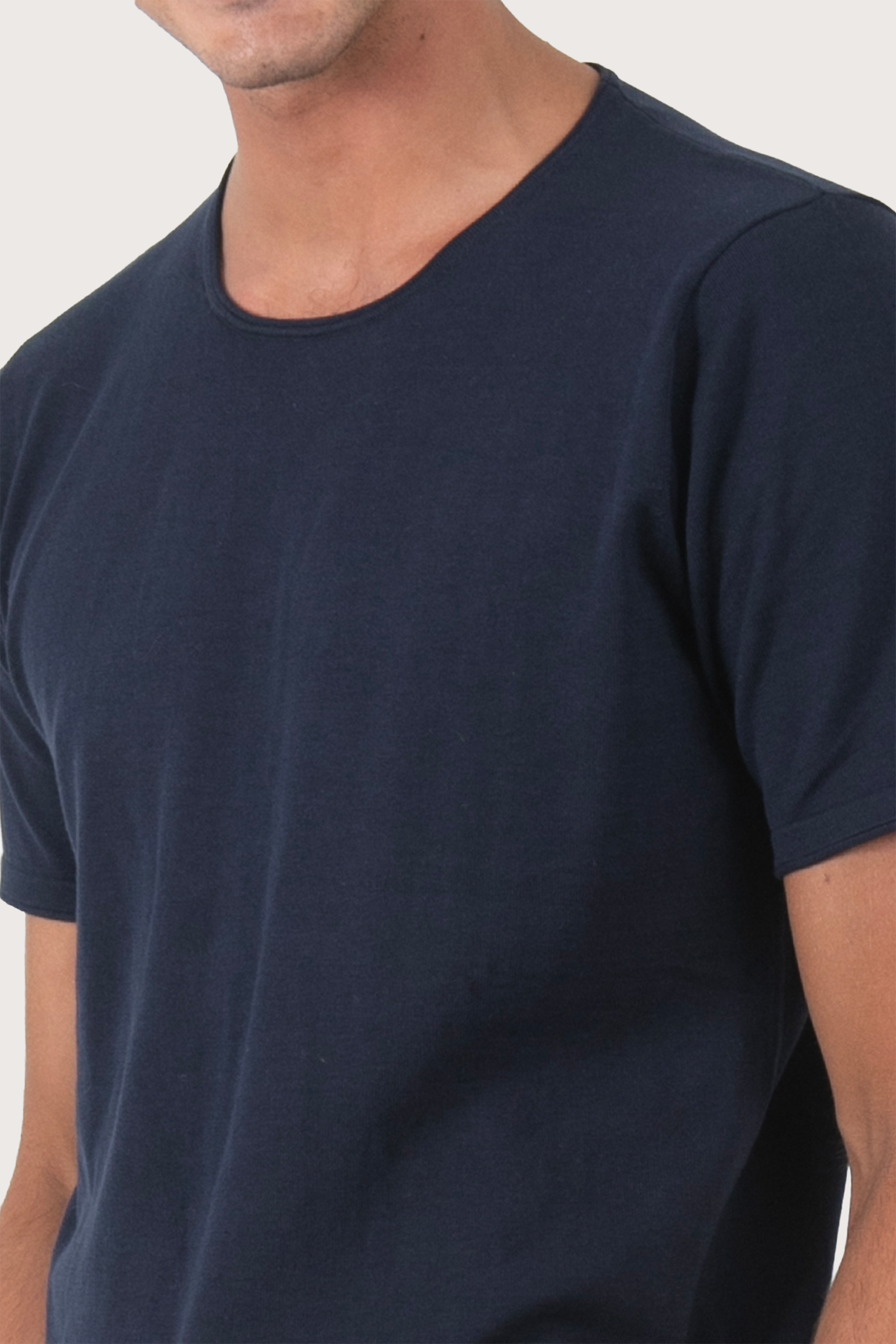 Close-up of the Arco Cotton Knit T-shirt Navy by By The Sea Bali – exceptional fabric quality and texture