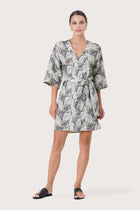 Woman wearing the Arumba Linen Dress Heart Leaves designed for effortless resortwear and tropical living by By The Sea Bali