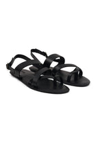Arus sandal front view showcasing elegant straps and minimalist resort aesthetic