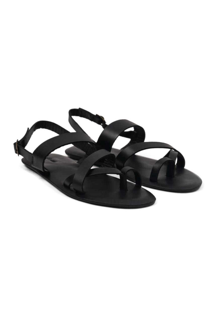 Arus sandal front view showcasing elegant straps and minimalist resort aesthetic