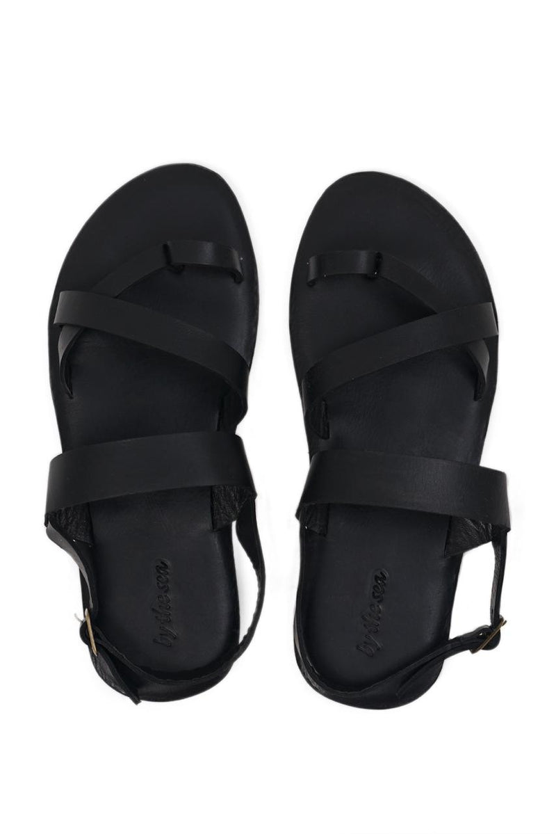 Arus sandal shown in a global view highlighting its full silhouette and refined resort-ready design
